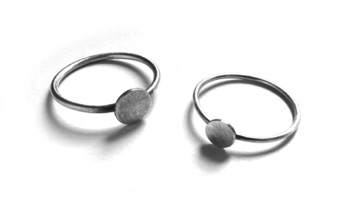 MINI $65 & $60-sterling silver rings with sanding disk texture on dots (16 and 18 gauge wire) made to size specifications MINI $65 & $60-sterling silver rings with sanding disk texture on dots (16 and 18 gauge wire) made to size specifications